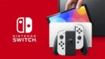 Nintendo Switch (modelo OLED) con base y mandos Joy-Con blancos - Imagen 3